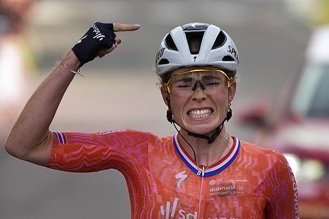 Tour de France Women cycling race: Stage winner Demi Vollering of The Netherlands reacts as she crosses the finish line after the eighth stage